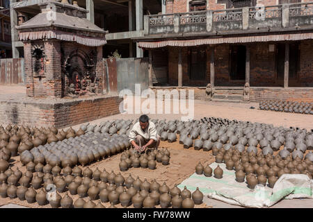 Bhaktapur, Nepal.  Potter at Work in Potters' Square. Stock Photo