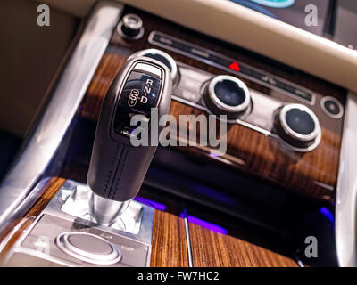 Close-up of automatic transmission gearshift In a luxury SUV, shallow depth of field Stock Photo