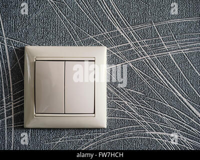 Light switch on the wall Stock Photo