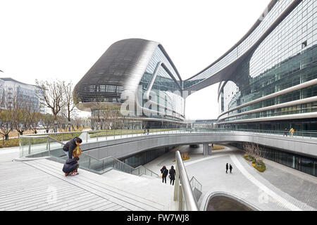 Overall view of multi-level landscaping and exterior facades. Sky SOHO, Shanghai, China. Architect: Zaha Hadid Architects, 2014. Stock Photo