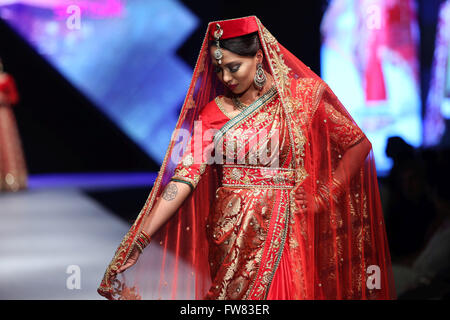 Kathmandu, Nepal. 31st Mar, 2016. A model presents a creation during the second day of TGIF Nepal Fashion week in Kathmandu, Nepal, March 31, 2016. The four-day fashion week will present both domestic and foreign designers' creations. © Sunil Sharma/Xinhua/Alamy Live News Stock Photo