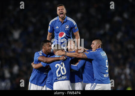 Bogota, Colombia. 31st Mar, 2016. Millonarios' players celebrate scoring during the postponed match of the Aguila League of Colombian professional soccer, against Atletico Nacional, at Nemesio Camacho 'El Campin' stadium, in Bogota city, Colombia, on March 31, 2016. Millonarios won 2-1. © Jhon Paz/Xinhua/Alamy Live News Stock Photo