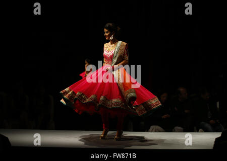 Kathmandu, Nepal. 31st Mar, 2016. A Nepalese model catwalk on the runway on the second day of Nepal fashion week also known as The Himalayan Times TGIF Nepal Fashion Week at Hyatt Regency in Kathmandu, Nepal on Thursday, March 31, 2016. Celebrities and fashion models from around the world come to represent for the designers to promote their designs. The event is the top most fashion week of the country held annually by The Himalayan Times, a leading and largest selling English daily newspaper in Nepal. The fashion week lasts for 4 days with glitz and glamor on the catwalk. (Credit Image: © S Stock Photo