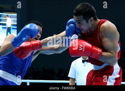 Qian'an, China's Hebei Province. 1st Apr, 2016. Shakhram Giyasov (R) of Uzbekistan competes against Saylom Ardee of Thailand during the final match of the men's 69kg category competition at the Asia/Oceania Zone boxing event qualifier for 2016 Rio Olympic Games in Qian'an, north China's Hebei Province, April 1, 2016. Credit:  Yang Shiyao/Xinhua/Alamy Live News Stock Photo