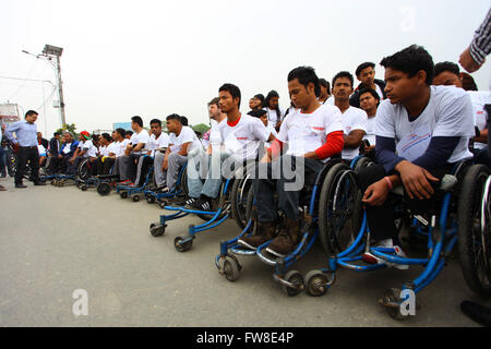 Kathmandu, Nepal. 2nd Apr, 2016. Disabled people and earthquake survivors get ready to participate in a 5km wheelchair race in Kathmandu, Nepal, April 2, 2016. The race is organized to support and encourage earthquake survivors and motivate them in the society. Credit:  Sunil Sharma/Xinhua/Alamy Live News Stock Photo