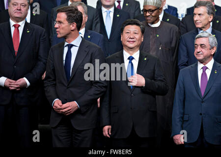 Serzh Sargsyan, Armenia's president, from right, Xi Jinping, China's president, and Mark Rutte, Dutch prime minister, stand during a family photo at the Nuclear Security Summit in Washington, DC, U.S., on Friday, April 1, 2016. After a spate of terrorist attacks from Europe to Africa, U.S. President Barack Obama is rallying international support during the summit for an effort to keep Islamic State and similar groups from obtaining nuclear material and other weapons of mass destruction. Credit: Andrew Harrer/Pool via CNP - NO WIRE SERVICE - Stock Photo