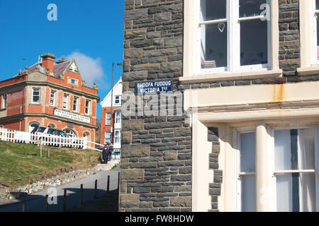 Aberystwyth Wales seafront terrace housing in Victoria Terrace with the Aberystwyth Cliff Railway station behind to left Stock Photo