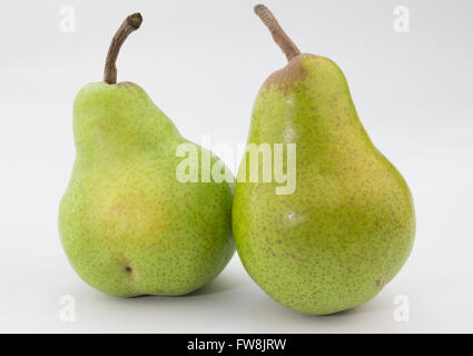 Two imperfect green pears isolated on white background Stock Photo