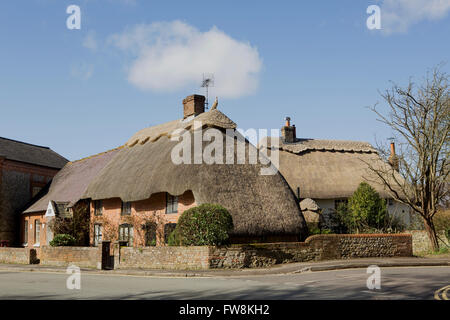View of the picturesque village of Bosham in West Sussex. Typical English thatched cottages. Stock Photo