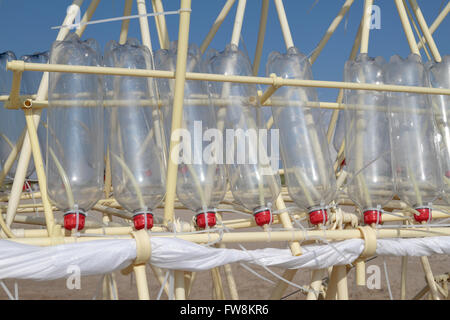 Detail of plastic drink bottles used on an original Strandbeest creation by Theo Jansen on the beach near the Hague, Netherlands Stock Photo