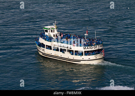 The American tour boat Maid of the mist comes back after driving near the Canadian Horseshoe falls in Niagara Falls Ont., on Tue Stock Photo