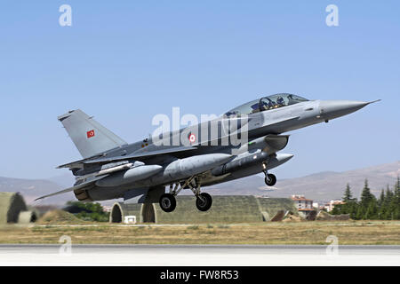 A Turkish Air Force modern F-16D Block 50+ Fighting Falcon equipped with conformal fuel tanks. These fuel tanks increase the ran Stock Photo