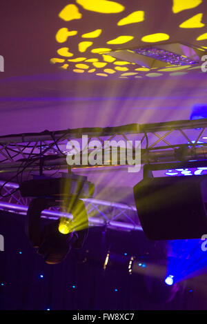 Detail of a stage lighting rig or set up similair to set ups that are used in theatre and conference lighting to change the mood and atmosphere at events. Stock Photo