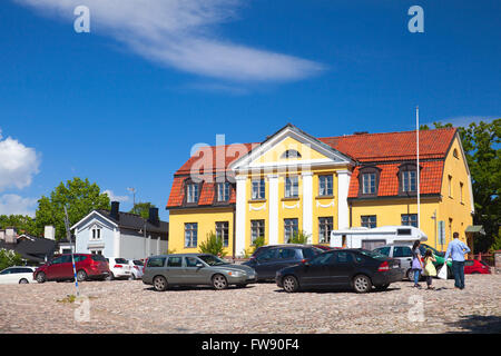 Porvoo, Finland - June 12, 2015: Street view of historical Finnish town Porvoo with ordinary people walking near old bright yell Stock Photo