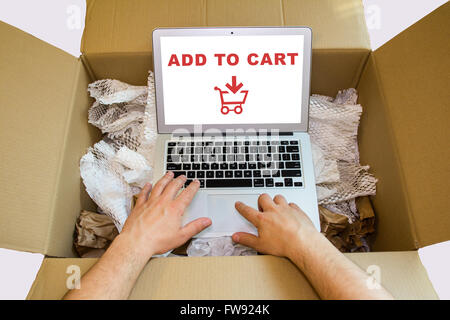 User online shopping adding order to cart on laptop computer Stock Photo