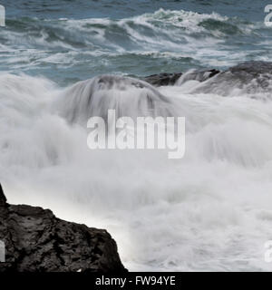 Wave splashing at coast, Pettinger Point, Cox Bay, Pacific Rim National Park Reserve, Tofino, British Columbia, Canada Stock Photo