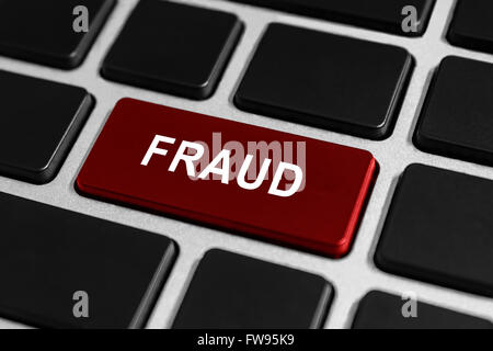 fraud red button on keyboard, business concept Stock Photo