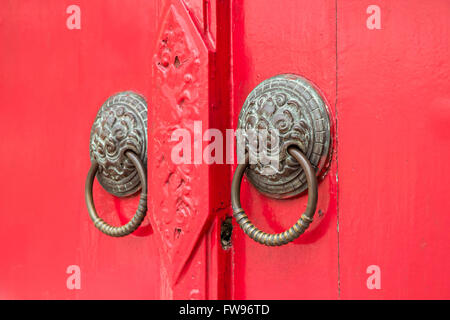 door knockers focus on the right knocker Stock Photo