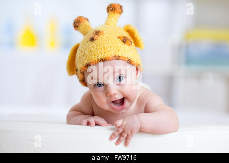 baby child in costume of giraffe Stock Photo