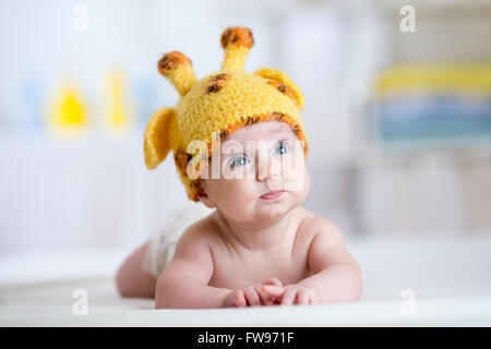 baby child in costume of giraffe Stock Photo