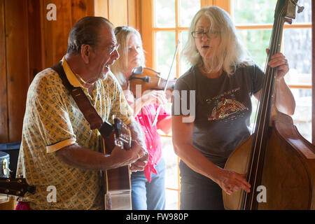 Music on the Mountain bluegrass jam at Table Rock State Park in South Carolina. Stock Photo