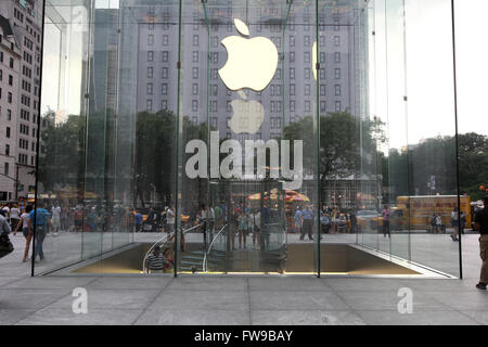 People enter the Apple store on 5th Avenue in New York City, NY., on Monday July 8, Stock Photo