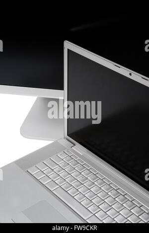 Modern laptop and the display on a white background Stock Photo