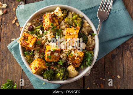Homemade Quinoa Tofu Bowl with Roasted Veggies and Herbs Stock Photo