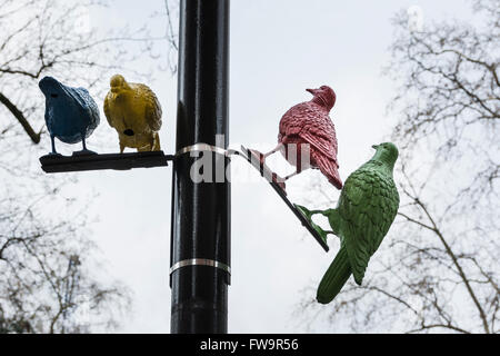 Patrick Murphy’s fabulous flock of pigeons sculpture in Soho Square in London, UK Stock Photo