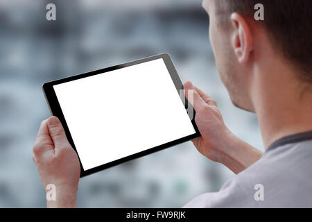Tablet with isolated screen for mockup in man hands. City life in background. Isolated device screen for design, interface promo Stock Photo