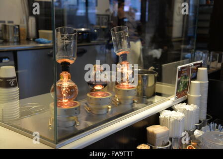 Glass vacuum coffee makers in a coffee shop in Kyoto, Japan Stock Photo