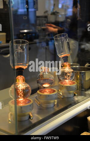 Glass vacuum coffee makers in a coffee shop in Kyoto, Japan Stock Photo