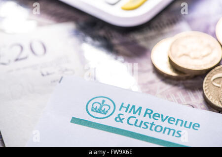 2016 British Tax return reminder with notes and coins Stock Photo