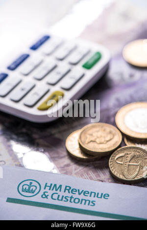 2016 British Tax return reminder with notes and coins Stock Photo