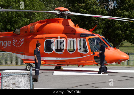 An Ornge air ambulance stands on a helipad near Kingston General Hospital(KGH) in Kingston Ont., on Thursday Aug. 14, 2015. Stock Photo