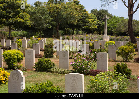 Sri Lanka, Trincomalee, Uppuveli, Commonwealth War Cemetery, graves and main cross memorial Stock Photo