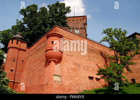 Krakow, Poland:  Imposing bastion with small round watch tower on the medieval defensive Wawel Hill defensive walls Stock Photo
