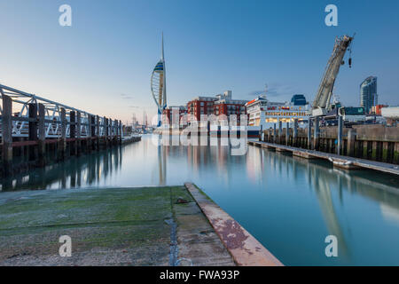 Evening in Portsmouth Harbour, UK. Spinnaker Tower in the distance Stock Photo