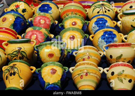 Colourful ceramic wall pots for sale at a street market, Benalmadena, Costa del Sol, Andalusia, Spain. Stock Photo
