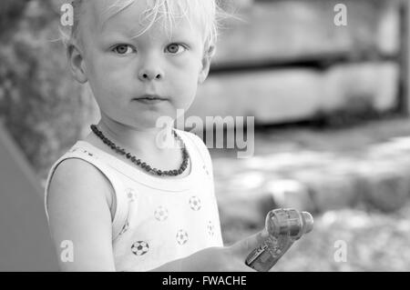 Black and white close up portrait of toddler Stock Photo