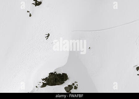 VERBIER, Switzerland: April, 2, 2016 Swiss freeride snowboarder Anne-Flore Marxer competes at the Verbier Xtreme contest. Stock Photo