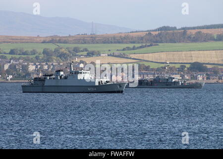 ENS Sakala (left) and ORP Flaming (right) are seen anchored off Greenock before participating in Exercise Joint Warrior 14-2. Stock Photo