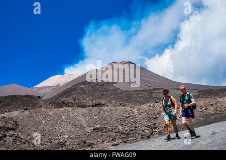 Tourists and hikers. Mount Etna volcano. Nicolisi, Catania, Sicily, Italy Stock Photo