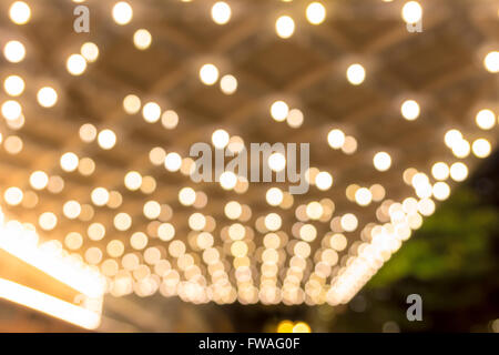 Blurred defocused bokeh Marquee Lights on theater entrance ceiling on Broadway in Portland Oregon downtown entertainment distric Stock Photo