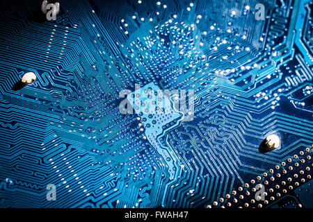 Electronic circuit board close up. blue PCB Stock Photo