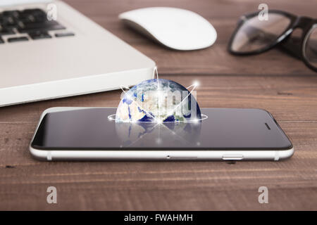 earth on phone screen network concept elements of this image furnished by nasa Stock Photo