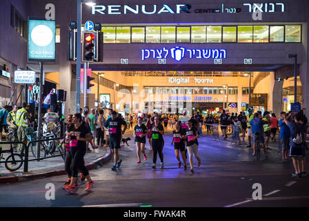 Coca-Cola Tel Aviv Night Run in Tel Aviv city, Israel. Dizengoff Centre Shopping Mall on photo Stock Photo