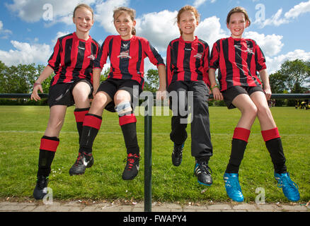 Girls playing football in Holland Stock Photo