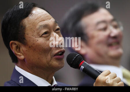 Osaka, Japan. 2nd April, 2016. Terry Gou (left), Founder and Chairman of Taiwanese electronics contractor Foxconn (official name Hon Hai Precision Industry Co., Ltd.), and Kozo Takahashi, President and CEO of Sharp Corporation, speak at a joint press conference held at Sakai Display Products Corporation on April 2, 2016 in Sakai Ward, Osaka, Japan. Gou and Takahashi announced the final terms for the deal for the Foxconn to acquire Japans Sharp at discounted rate on after a month of uncertainty. Credit:  Aflo Co. Ltd./Alamy Live News Stock Photo