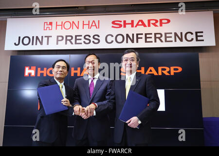 Osaka, Japan. 2nd April, 2016. J.W. Tai, Corporate Executive VP, and Terry Gou, Founder and Chairman, both of Taiwanese electronics contractor Foxconn (official name Hon Hai Precision Industry Co., Ltd.), and Kozo Takahashi, President and CEO of Sharp Corporation, appear at a joint press conference held at Sakai Display Products Corporation on April 2, 2016 in Sakai Ward, Osaka, Japan. Gou and Takahashi announced the final terms for the deal for the Foxconn to acquire Japan's Sharp at discounted rate on after a month of uncertainty. Credit:  Aflo Co. Ltd./Alamy Live News Stock Photo